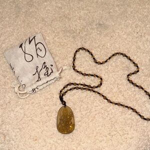 Amber Beaded Necklace with Buddha Pendant